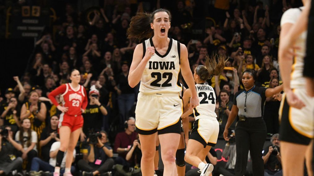 Iowa guard Caitlin Clark (22) celebrates after becoming the all-time leading scorer in NCAA Division I basketball during the first half of a college game against Ohio State, Sunday, March 3, 2024, in Iowa City, Iowa. (AP Photo/Cliff Jette)