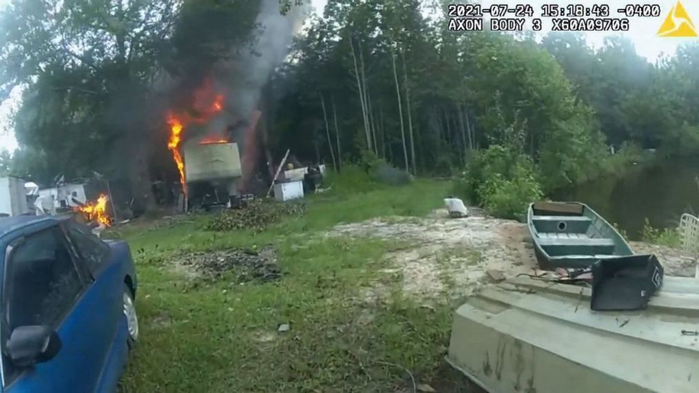 Sheriff's officers rescued two dogs trapped close to a burning trailer near Metter, Georgia. (Candler County Sheriff's Office:Zenger)