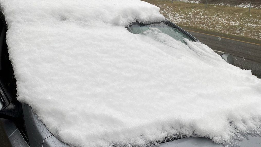 Driver ticketed for driving with windshield almost completely covered in snow. (Photo: Washington State Patrol)