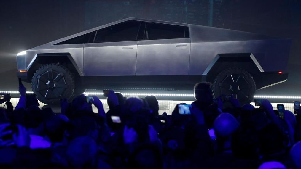 The Tesla Cybertruck is unveiled at Tesla's design studio Thursday, Nov. 21, 2019, in Hawthorne, Calif. CEO Elon Musk is taking on the workhorse heavy pickup truck market with his latest electric vehicle. (AP Photo/Ringo H.W. Chiu)