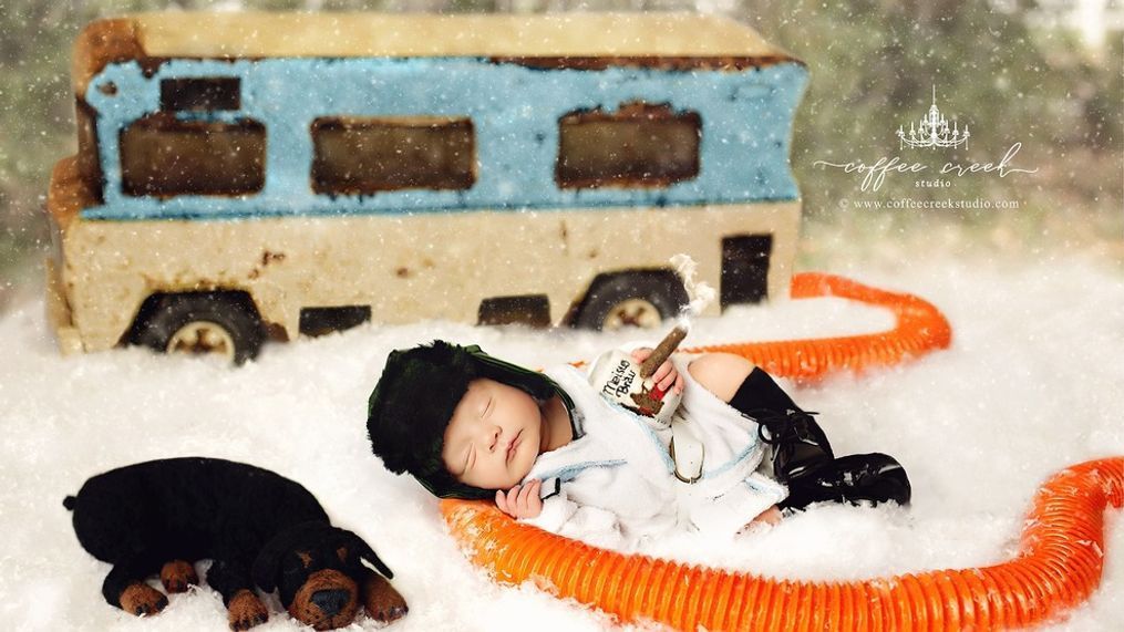 Newborns pose as Clark Griswold, Cousin Eddie for 'Christmas Vacation' photoshoot (Coffee Creek Studio by Amy Haehl)