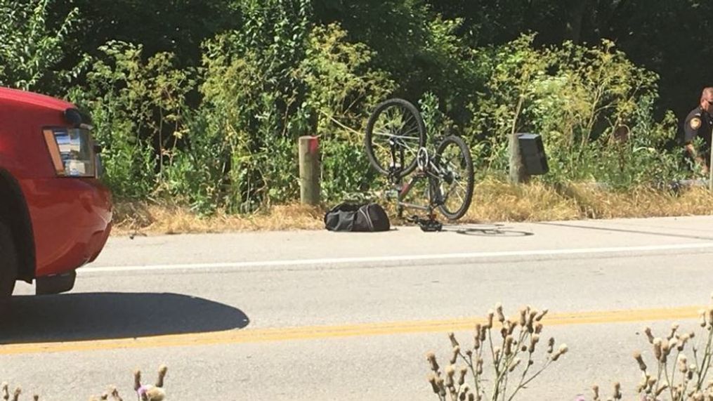 Crews were searching around Big Walnut Creek in south Columbus after reports a tractor trailer hit a bicyclist, knocking him over a guardrail on Tuesday morning, June 26, 2018. Police said the driver fled. (WSYX/WTTE)