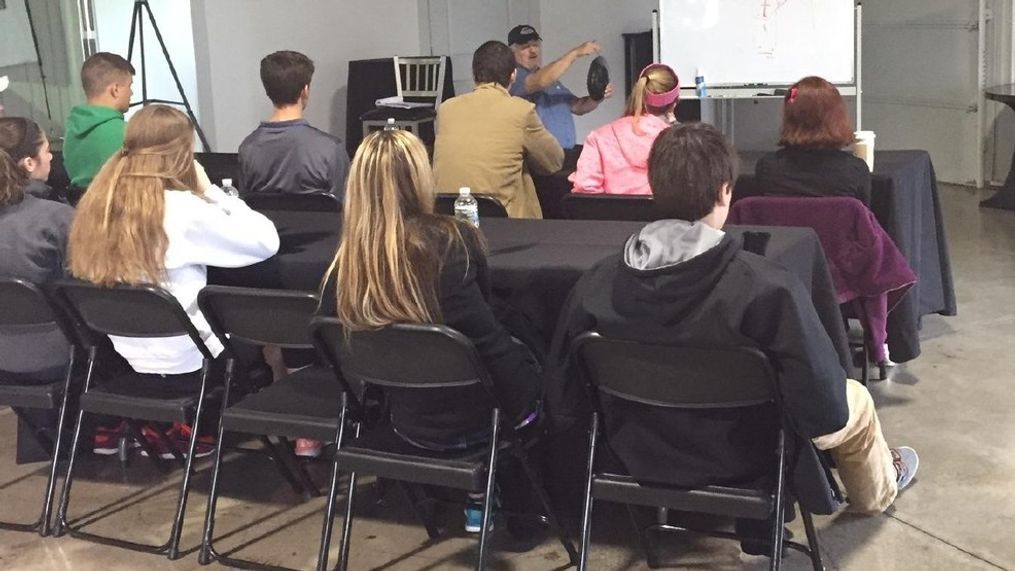 During the classroom portion of the Teen Driving Academy at the Autobahn Country Club in Joliet, Illinois, instructors discuss proper driving position before getting behind the wheel of a fleet cars used in the driving drills. (Sinclair Broadcast Group / Jill Ciminillo)