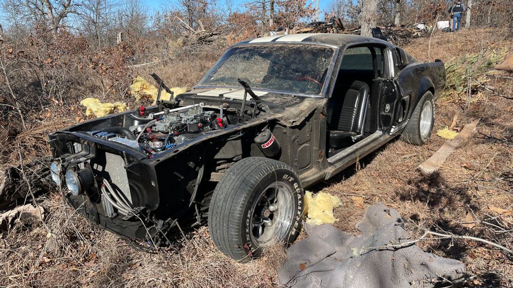 {p}A photo provided by Tulsa police Friday, January 28, 2022, showsa stolen 1967 Ford Mustang Shelby GT500 that was found in a field in Mounds, Okla.Police said the car’s engine appears intact, but the doors, fenders and hoodhad been removed. (TPD){/p}