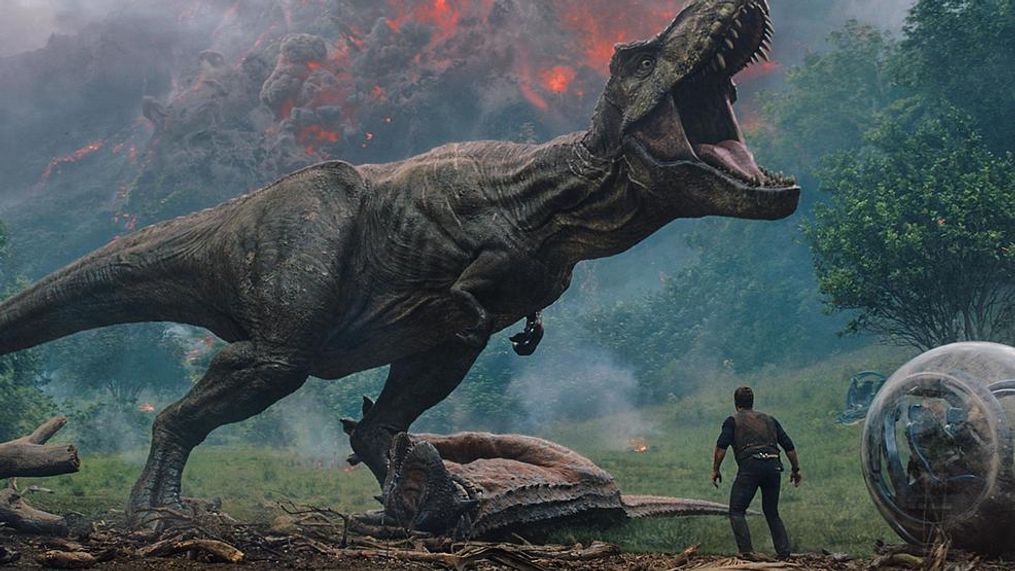 Owen (CHRIS PRATT) comes between the mighty T. rex and Claire (BRYCE DALLAS HOWARD) and Franklin (JUSTICE SMITH) in "Jurassic World: Fallen Kingdom."  When the island's dormant volcano begins roaring to life, Owen and Claire mount a campaign to rescue the remaining dinosaurs from this extinction-level event.  Welcome to "Jurassic World: Fallen Kingdom."{&nbsp;}(Photo: Universal Pictures)