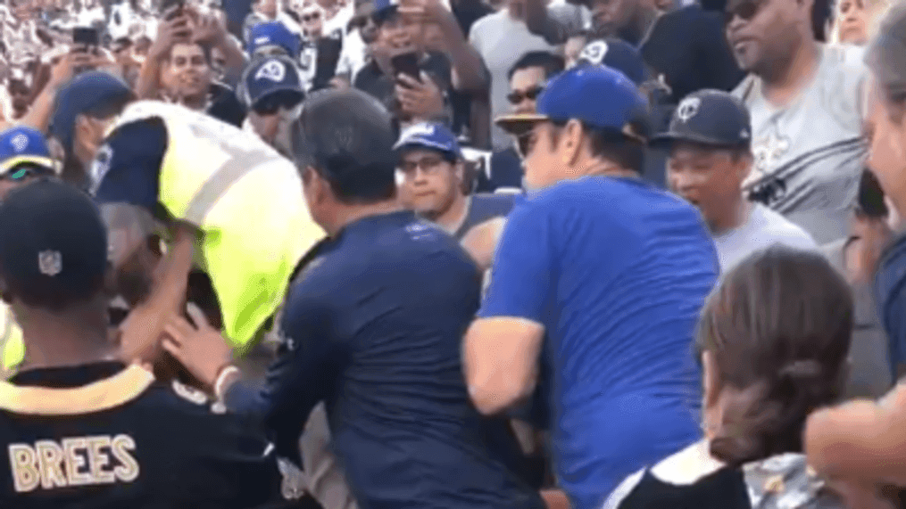 Security officers Tackle 'belligerent' LA Rams fans before removing them from stadium (Brian Moyers via Storyful)