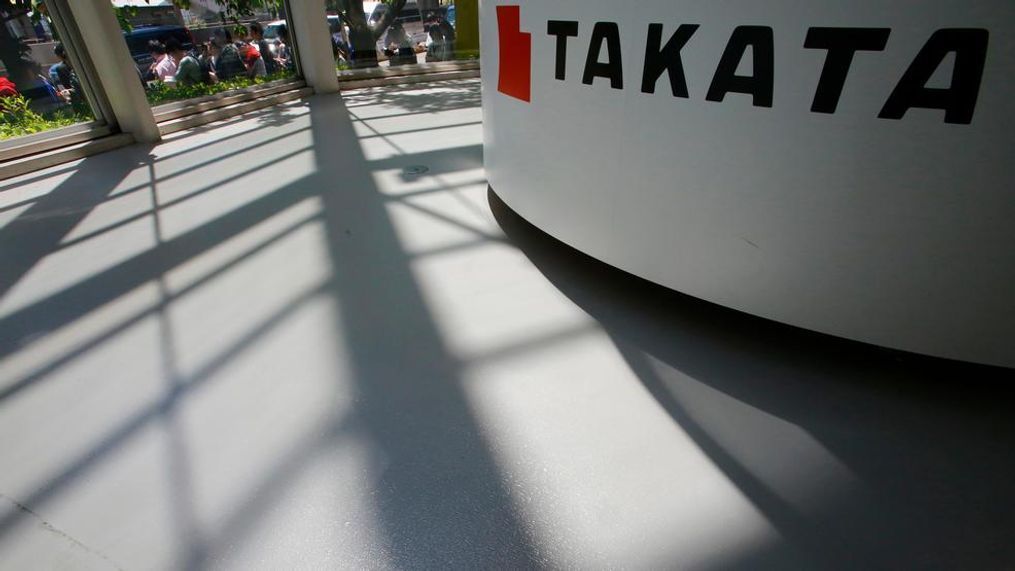 In this May 4, 2016, photo, shadows are cast near a Takata Corp.'s reception desk at the automaker's showroom in Tokyo. Another person has died in Malaysia after a faulty Takata airbag inflator exploded when the Honda it was installed in crashed, raising the known death toll linked to the defect in the Southeast Asian country to six. The driver was killed when the 2004 Honda City car crashed on New Year's Day in central Selangor state, Honda Malaysia said Tuesday, Jan. 30, 2018 in a statement. (AP Photo/Shizuo Kambayashi)