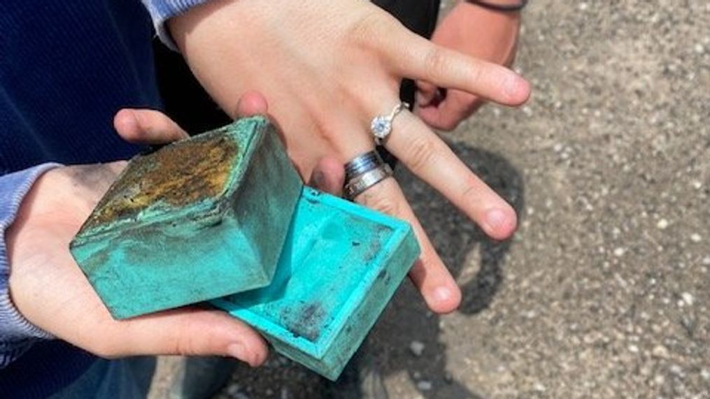 The bride-to-be shows off her engagement ring after her then-boyfriend's car caught fire in Tennessee. (Photo: Williamson Fire-Rescue)