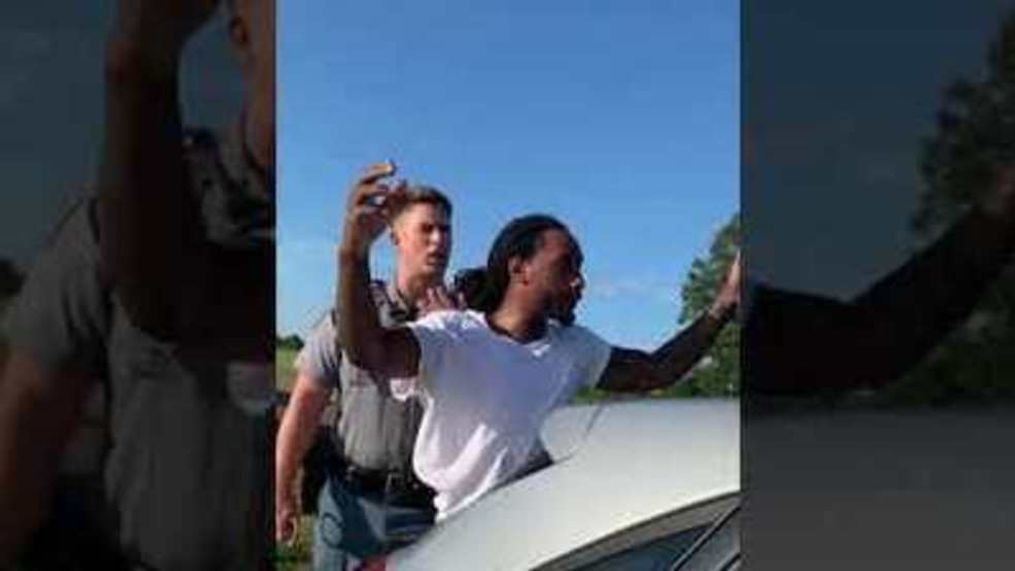 Black man grabbed by neck as Mississippi traffic stop turns violent (Porsha Shields via Storyful)