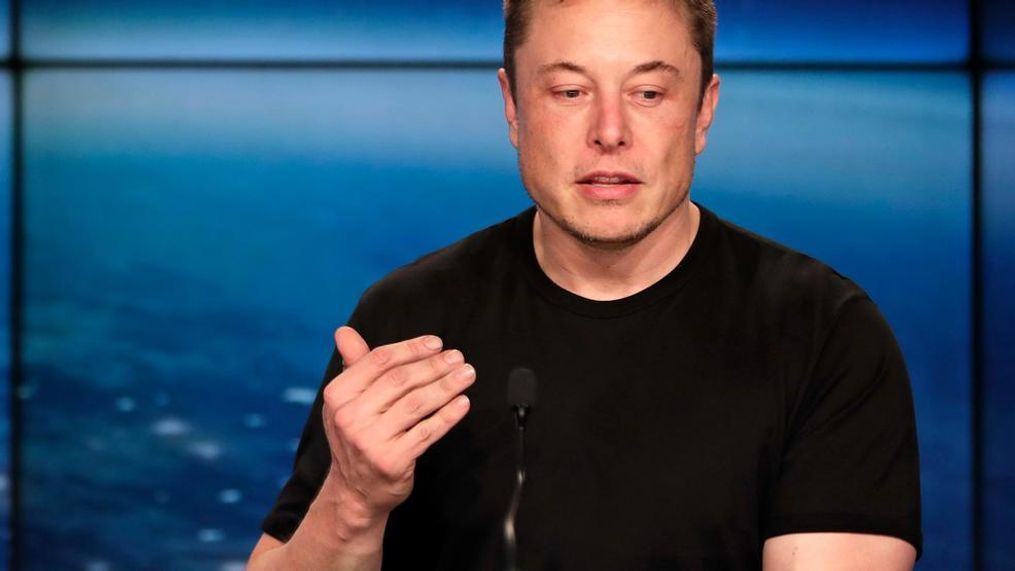 In this Feb. 6, 2018, file photo, Elon Musk, founder, CEO of SpaceX and CEO of Tesla Inc., speaks at a news conference after the Falcon 9 SpaceX heavy rocket launched successfully from the Kennedy Space Center in Cape Canaveral, Fla. Shareholders of electric car and solar panel maker Tesla Inc. are voting on a pay package for Musk that could net him more than $50 billion if he meets lofty milestones over the next decade that include raising the company's market value tenfold. (AP Photo/John Raoux, File)