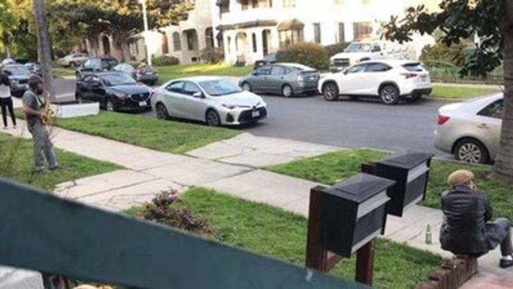 Los Angeles Neighbors Serenade Street With Sax and Harmonica Jam (Lucy Waterhouse via Storyful)