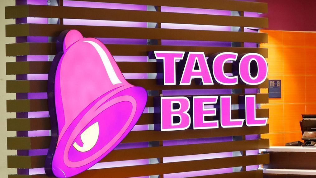 FILE - The Taco Bell logo is seen, April 19, 2019, at a restaurant in Miami. (AP Photo/Wilfredo Lee, File)