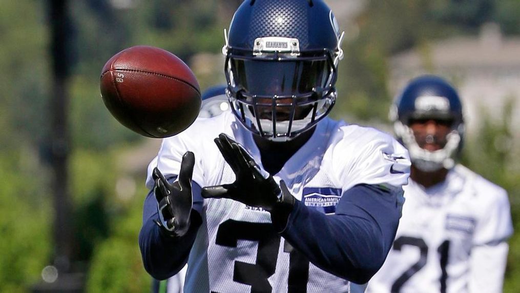 Seattle Seahawks strong safety Kam Chancellor catches the ball during an NFL football training camp, Monday, July 31, 2017, in Renton, Wash. (AP Photo/Ted S. Warren)