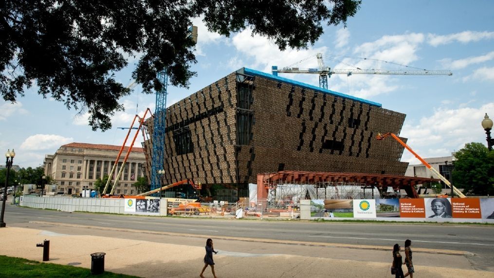 In this photo taken June 9, 2015, construction continues on The Smithsonian's National Museum of African American History and Culture in Washington, scheduled to open in 2016. The Smithsonian now plans to acknowledge the sexual-assault allegations against Bill Cosby at its new African-American history museum on the National Mall, which will include two items related to CosbyÂ?s career in television and standup comedy.(AP Photo/Andrew Harnik)