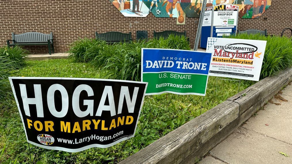 Signs are pictured outside an early voting center on Thursday, May 9, 2024, in Rockville, Md. (AP Photo/Robert Yoon)