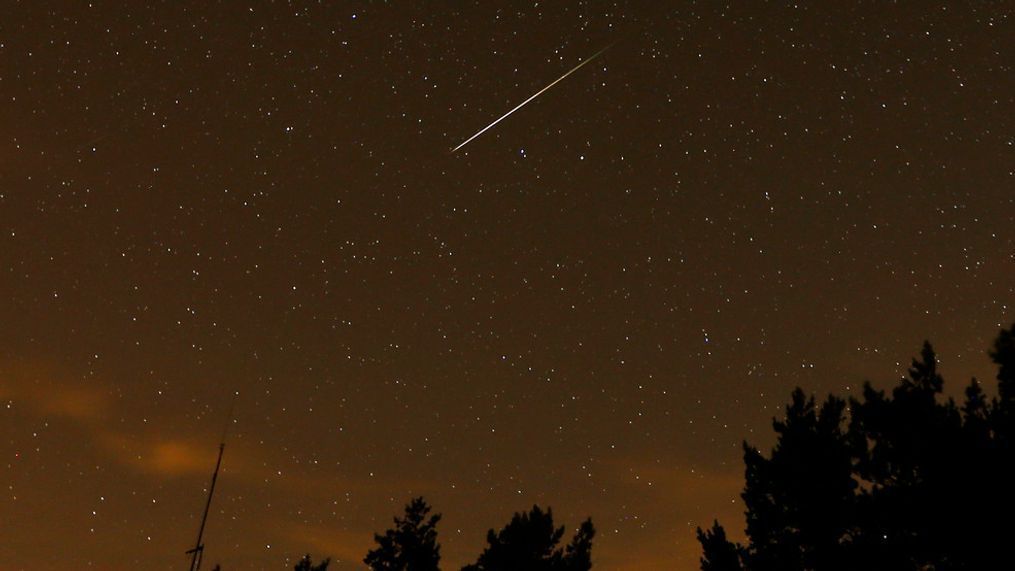 FILE - In this long exposure photo, a streak appears in the sky during the annual Perseid meteor shower at the Guadarrama mountains, near Madrid, in the early hours of Aug. 12, 2016. The best viewing for the annual shower visible around the world will be from Saturday night, Aug. 12, 2023, local time, into early Sunday morning, when viewers might be able to spot a meteor per minute. (AP Photo/Francisco Seco, File)