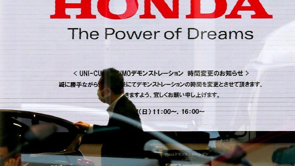 In this  Jan. 11, 2016, file photo, the logo of Honda Motor Co. is seen on a showroom screen at the Japanese automaker's headquarters in Tokyo. The Japanese automaker reported a 71 percent decline in fiscal third-quarter profit as air-bag recalls and flat vehicle sales eroded the benefits of cost cuts. (AP Photo/Shuji Kajiyama, File)