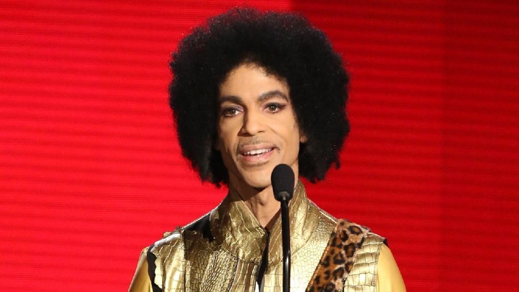 FILE - In this Nov. 22, 2015 file photo, Prince presents the award for favorite album - soul/R&B at the American Music Awards in Los Angeles. Prince, widely acclaimed as one of the most inventive and influential musicians of his era with hits including "Little Red Corvette," ''Let's Go Crazy" and "When Doves Cry," was found dead at his home on Thursday, April 21, 2016, in suburban Minneapolis, according to his publicist. He was 57. (Photo by Matt Sayles/Invision/AP, File)