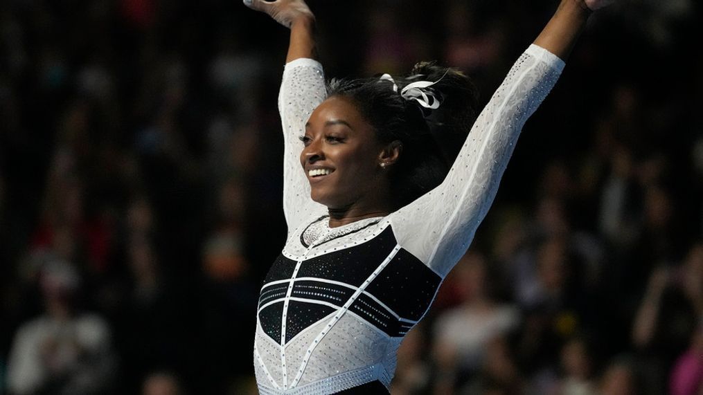 FILE - Simone Biles reacts after performing in the floor exercise at the U.S. Classic gymnastics competition Saturday, Aug. 5, 2023, in Hoffman Estates, Ill. (AP Photo/Erin Hooley)