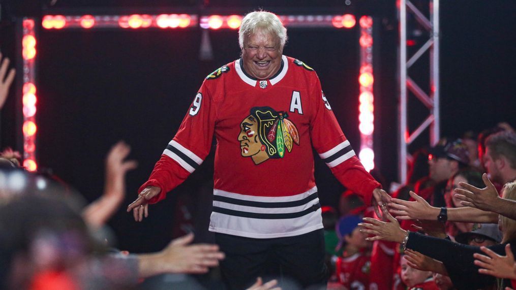 FILE - Former Chicago Blackhawks player Bobby Hull is introduced to fans during the NHL hockey team's convention in Chicago, July 26, 2019. Hull, a Hall of Fame forward who helped the Blackhawks win the 1961 Stanley Cup Final, has died. He was 84. The Blackhawks and the NHL Alumni Association announced the death of the two-time NHL MVP on Monday, Jan. 30, 2023. (AP Photo/Amr Alfiky, file)