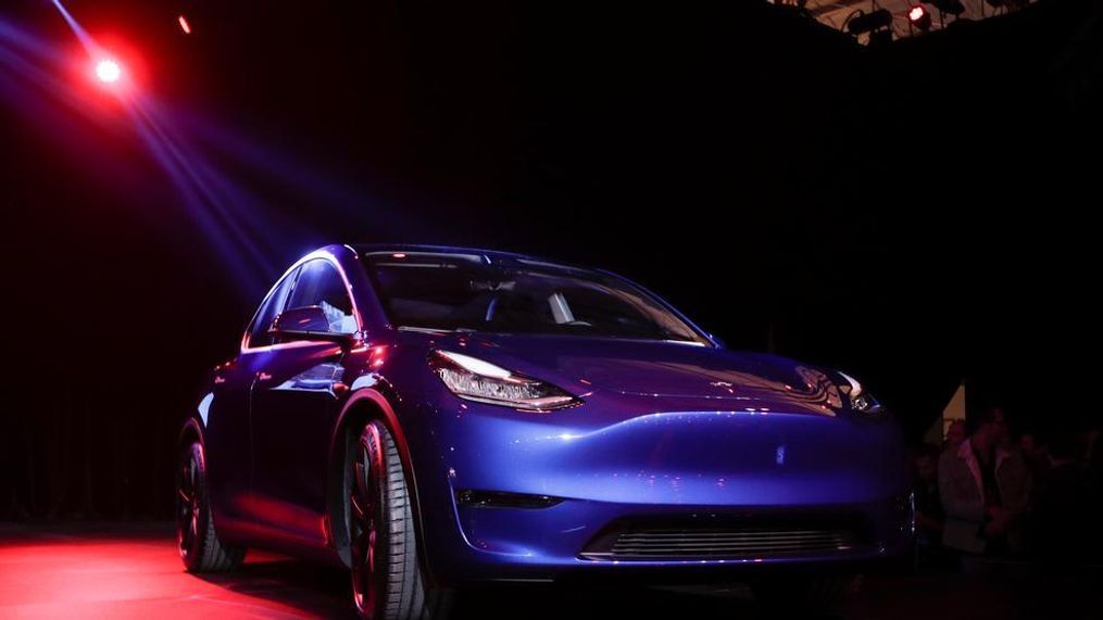 The Tesla Model Y is unveiled at Tesla's design studio Thursday, March 14, 2019, in Hawthorne, Calif. (AP Photo/Jae C. Hong)