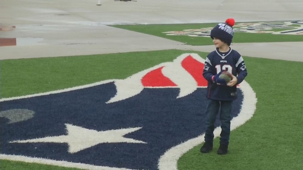 Five-year-old Noah Brady Thompson, who was named after star quarterback Tom Brady, brought a mini-football to pass back and forth with his dad at Gillette before picking up some coveted Patriots gear ahead of the big game. 