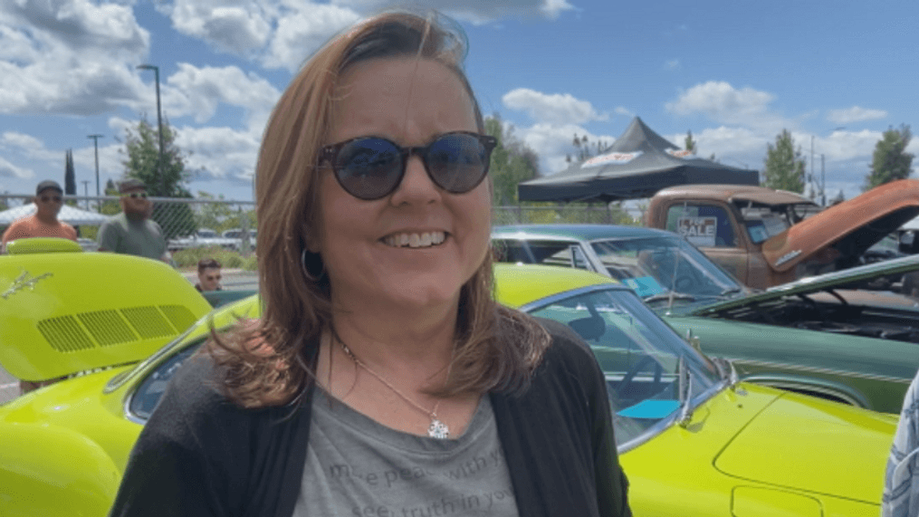 Joyce Lyn sold her 1974 Karmann Ghia VW in 1990, and on Saturday at Kool April Nites, her family gifted her with an identical one. (Photo: KRCR)