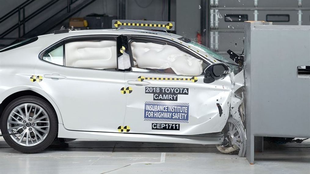 {p}Action shot taken of the 2018 Toyota Camry during the passenger-side small overlap frontal crash test. (Image courtesy of the Insurance Institute for Highway Safety){/p}