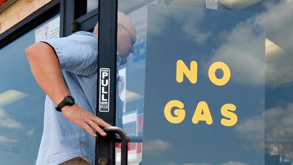 A customer walks into an Exxon filling station and convenience store location where a sign on the door reads, "No Gas," Thursday, Aug. 31, 2017, in Bedford, Texas. It’s getting harder to fill gas tanks in parts of Texas where some stations are out of fuel and pump costs are spiking. A major gasoline pipeline shuttered due to Harvey may be able to resume shipping fuel from the Houston area by Sunday, which could ease gasoline shortages across the southern U.S. (AP Photo/Tony Gutierrez)