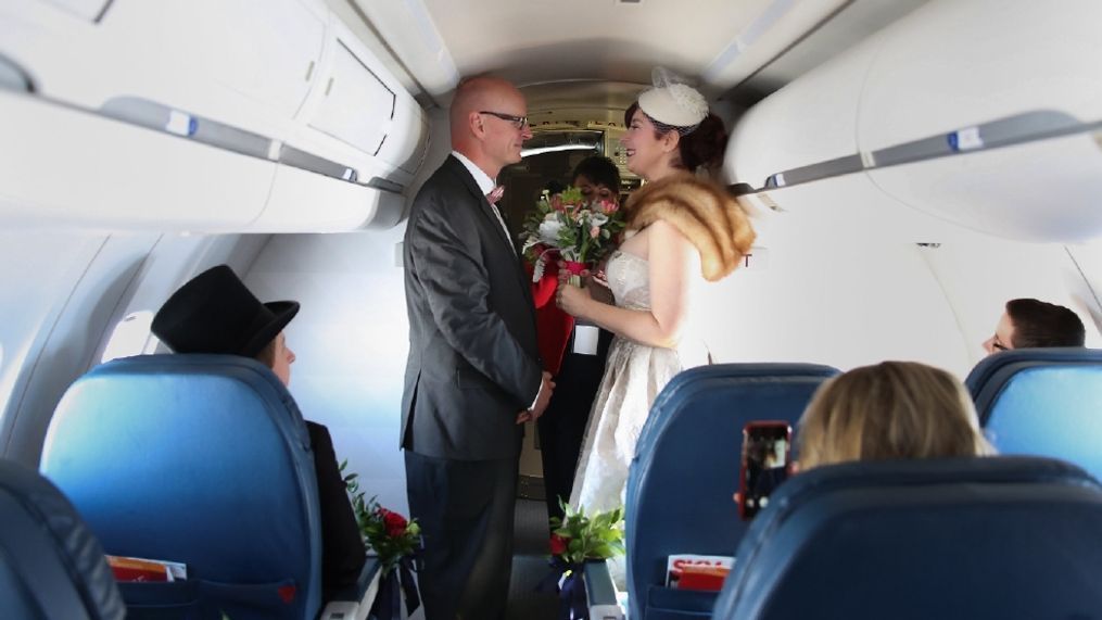 Couple gets married on flight from Cincinnati to DC. (Courtesy Sherri Barber)