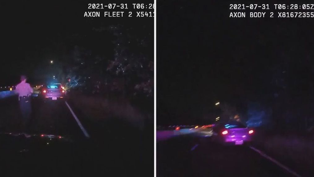 Video from both a dashboard camera and a body comera show a police officer allegedly hit and injured by a black four-door sedan in Centreville, Virginia on July 31, 2021. (@fairfaxcountyPD:Zenger)