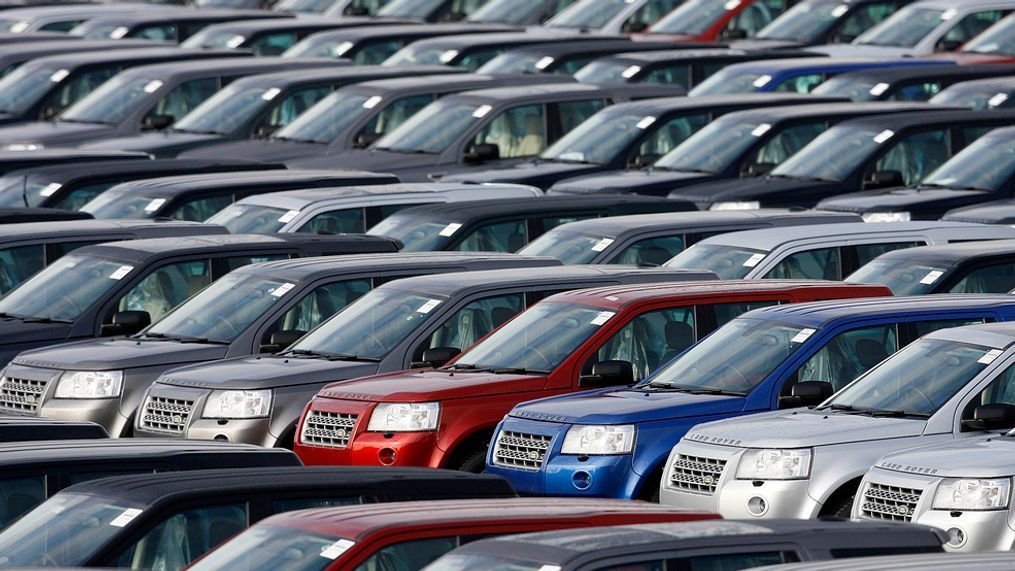 In this 2009 file photo, new Land Rover Freelander vehicles are stockpiled outside the Jaguar and Land Rover factory in Halewood, Liverpool, England. The British car industry association said Friday Jan. 5, 2017, that automobile sales in the country fell in 2017 for the first time in six years and are set to fall further this year largely because of subdued economic growth. (AP Photo/Paul Thomas, File){p}{/p}