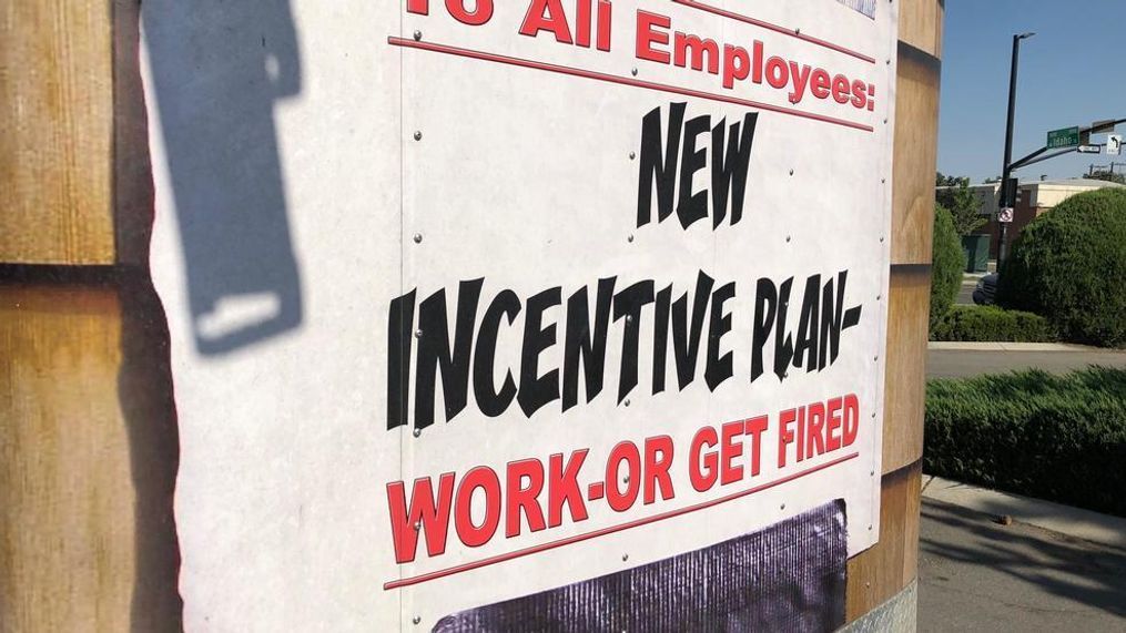 Brandon Spidell owns ABH Siding and Exterior Solutions. He proudly displays his eye-catching employee incentive sign on his trailer: work or get fired. (CBS 2News photo)