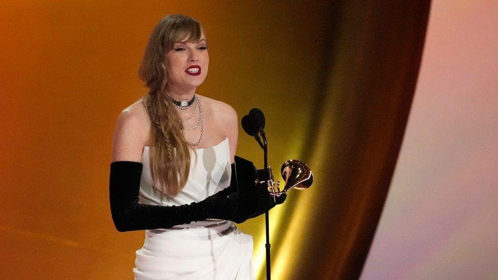 Taylor Swift accepts the award for best pop vocal album for "Midnights" during the 66th annual Grammy Awards on Sunday, Feb. 4, 2024, in Los Angeles. (AP Photo/Chris Pizzello)