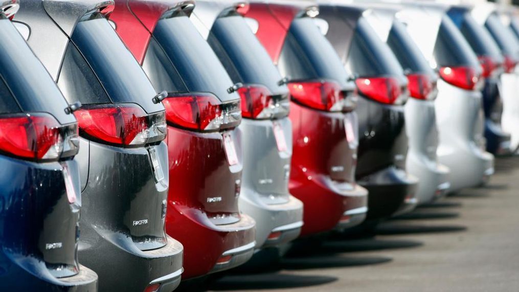 In this April 15, 2018 file photo, unsold 2018 Pacifica minivans sit on a Chrysler dealer's lot in the south Denver suburb of Englewood, Colo. Americans are being presented with two starkly different and inaccurate accounts of the state of the auto industry, one from President Donald Trump and the other from Democratic presidential candidate Kamala Harris. (AP Photo/David Zalubowski)