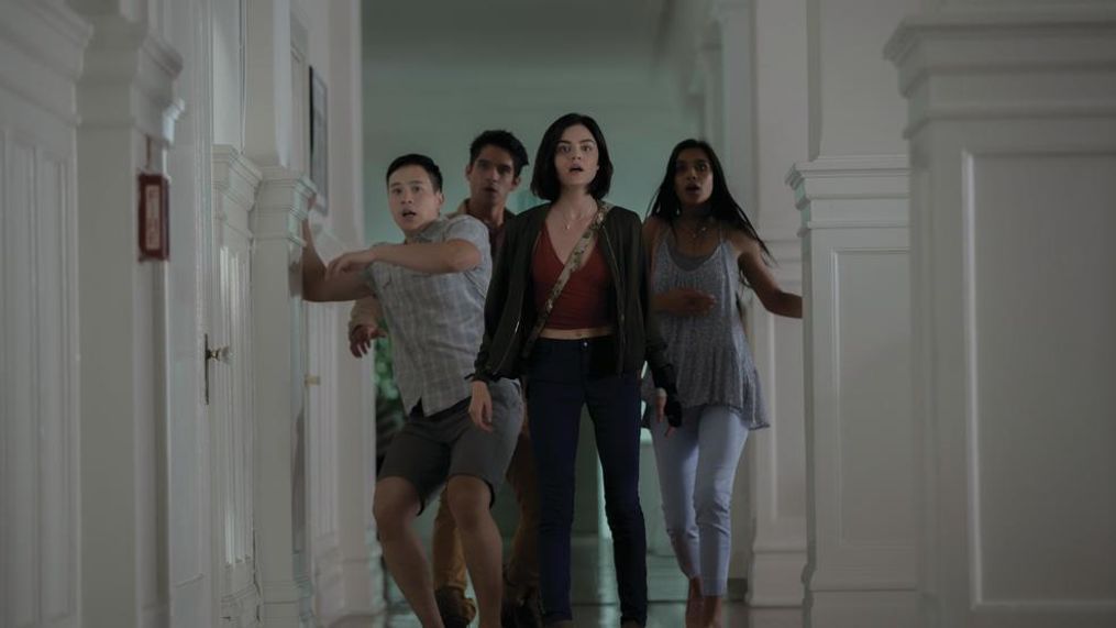 (L to R) Brad (HAYDEN SZETO), Lucas (TYLER POSEY), Olivia (LUCY HALL) and Penelope (SOPHIA TAYLOR ALI) in "Blumhouse’s Truth or Dare," a supernatural thriller from Blumhouse Productions.  A harmless game of “Truth or Dare” among friends turns deadly when someone—or something—begins to punish those who tell a lie—or refuse the dare. (Photo: Universal Pictures)