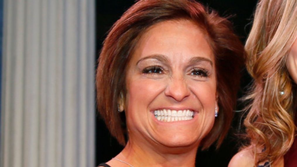 FILE - Oklahoma Hall of Fame inductee Shannon Miller, right, stands with her presenter, Mary Lou Retton, in Oklahoma City on Nov. 16, 2017. Retton. 55, is in intensive care in a Texas hospital fighting a rare form of pneumonia, according to her daughter McKenna Kelley. (AP Photo/Sue Ogrocki, File)