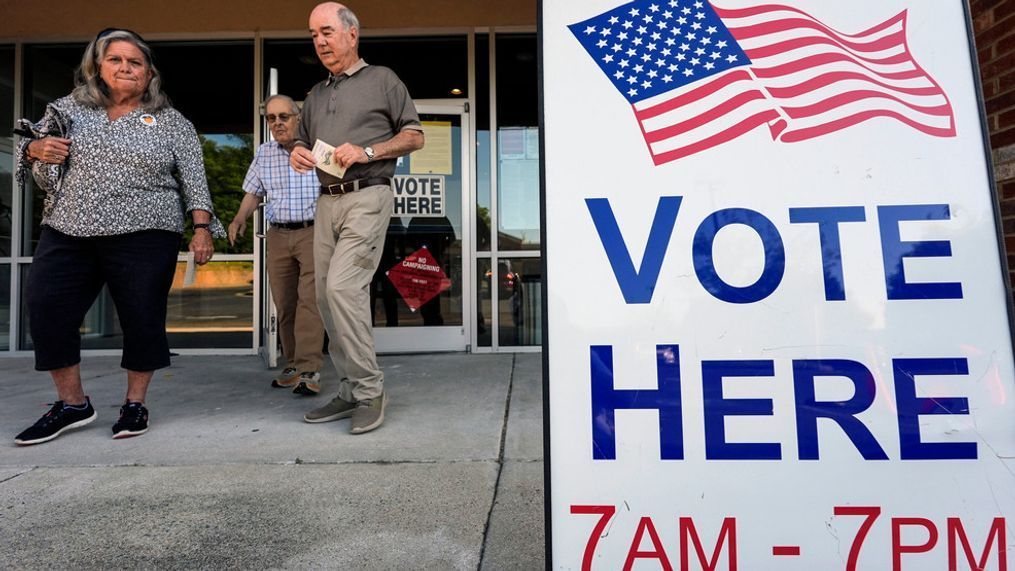 FILE - Voters depart an election center during primary voting, May 21, 2024, in Kennesaw, Ga. (AP Photo/Mike Stewart, File)