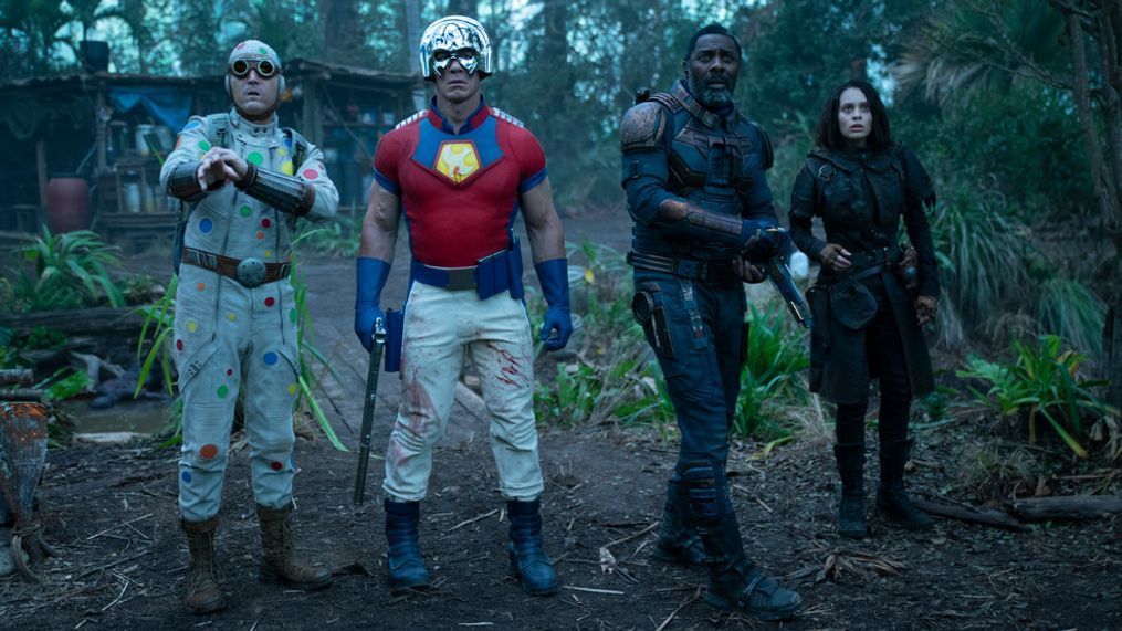 (L-r) DAVID DASTMALCHIAN as Polka Dot Man, JOHN CENA as Peacemaker, IDRIS ELBA as Bloodsport and DANIELA MELCHIOR as Ratcatcher 2 in Warner Bros. Pictures’ action adventure “THE SUICIDE SQUAD,” a Warner Bros. Pictures release.