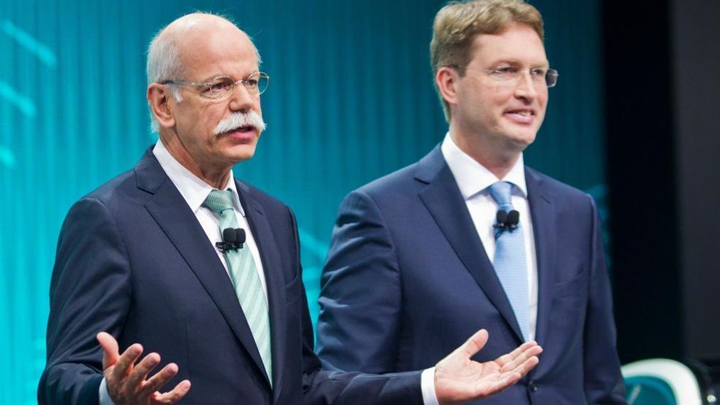 In this Jan. 13, 2014 file photo Mercedes-Benz marketing chief Ola Kallenius, right, stand with Daimler Chairman Dieter Zetsche at the end of a press conference at the North American International Auto Show in Detroit, Mich. Daimler AG said Wednesday, Sept. 26, 2018 that Kallenius will take over as the company's CEO in 2019. (AP Photo/Tony Ding, file)