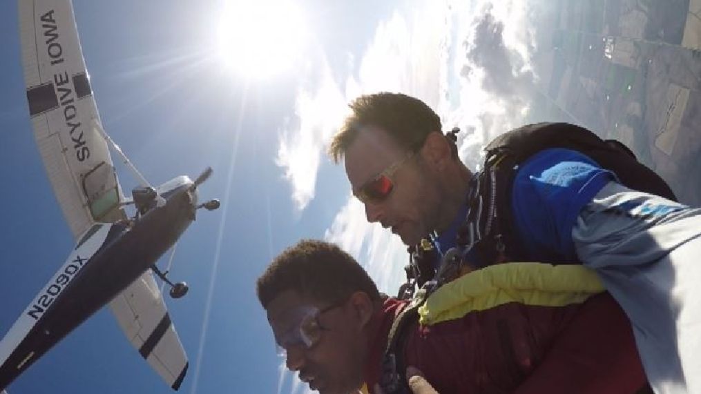 Danny Grimes (red) and Skydive Iowa instructor Brent Romberg begin their descent from 10,000 feet (photo courtesy of Skydive Iowa).