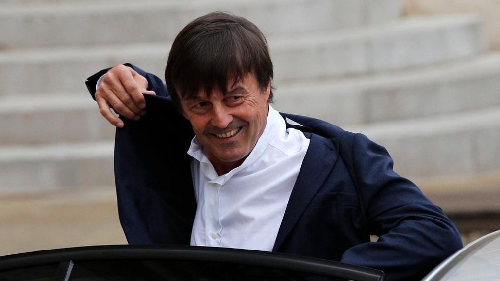 In this May 18, 2017, file photo, Environment Minister Nicolas Hulot arrives for the first weekly cabinet meeting under new French President Emmanuel Macron, at the Elysee Palace in Paris. Hulot unveiled a five-year plan to fight against climate change and fulfill the country's commitments under the Paris accord. Hulot said France will stop producing power from coal-power station by 2022. (AP Photo/Christophe Ena, File)