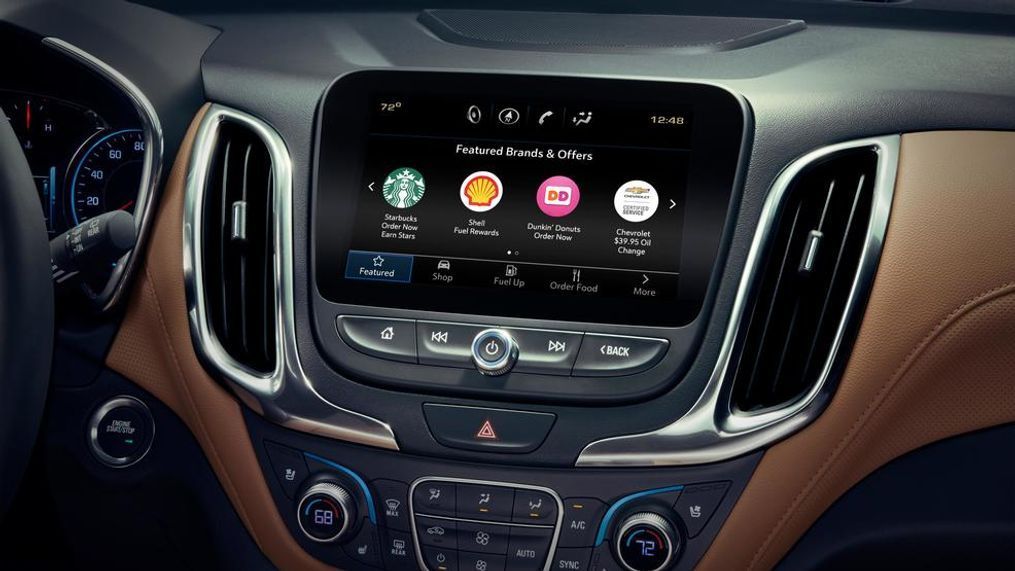 GM lets customers order their morning coffee with their car. Marketplace is the automotive industry’s first commerce platform for on-demand reservations and purchases of goods and services featuring brands such as Starbucks (Early 2018), Shell, Dunkin’ Donuts, TGI Fridays and more. (Image courtesy of General Motors)