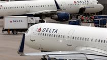 Image for story: Maggots fall onto passenger during Delta flight forcing return to Amsterdam