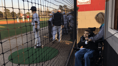 Image for story: Teenager wants his voice heard in the big leagues, not letting wheelchair hold him back