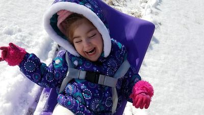 Image for story: WATCH: Tennessee mom creates adaptive sled to give daughter the best snow day ever