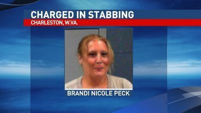 Image for story: Woman stabs female who refused to trade cigarettes for perfume bottle, court records say