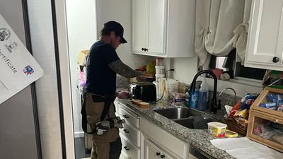 Image for story: Firefighter makes breakfast for kids after mom goes to hospital