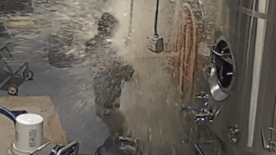 Image for story: VIDEO: Brewer gets blasted by beer when valve fails