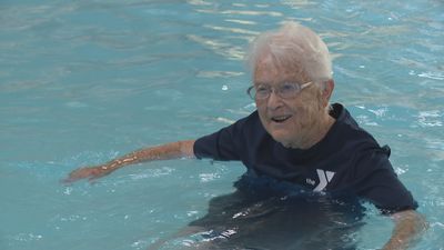 Image for story: 102-year-old makes waves for over 50 years by teaching generations to swim